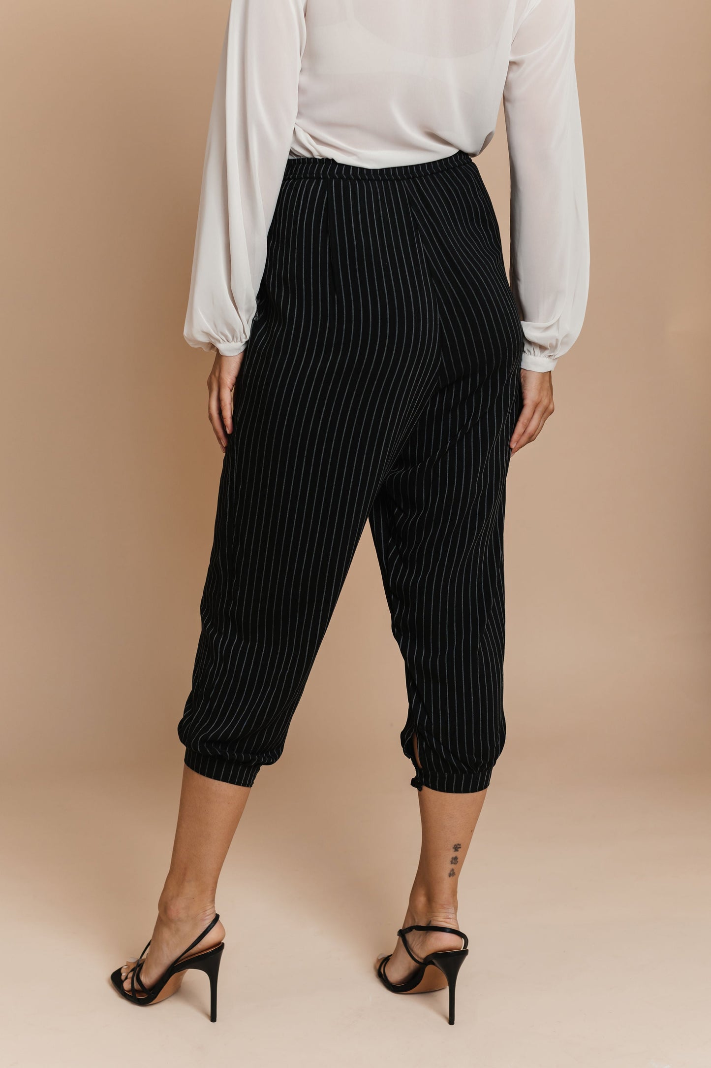 Pinstriped Pants with embroidered details by BYNES NEW YORK | Apparel & Accessories