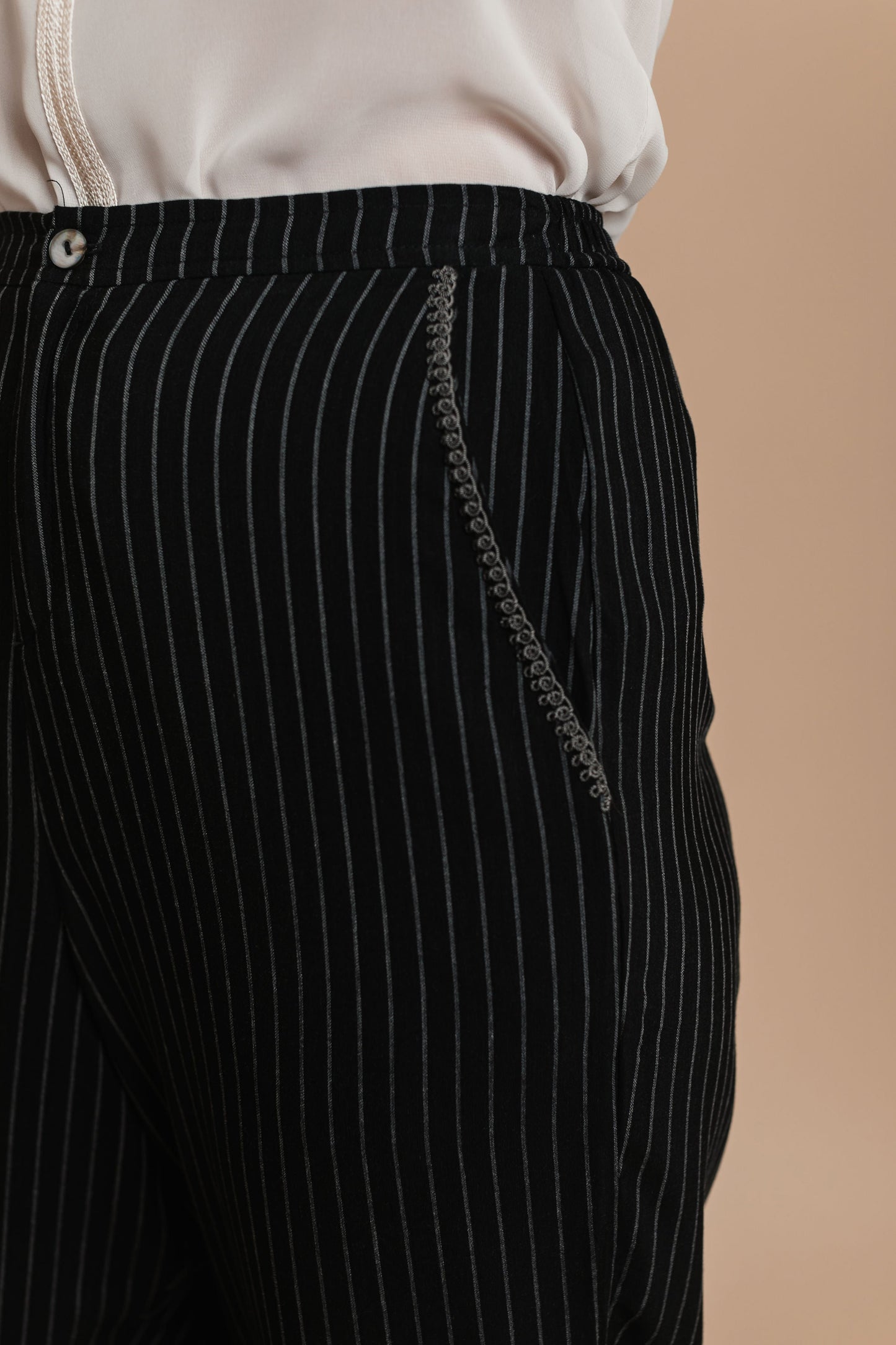 Pinstriped Pants with embroidered details by BYNES NEW YORK | Apparel & Accessories